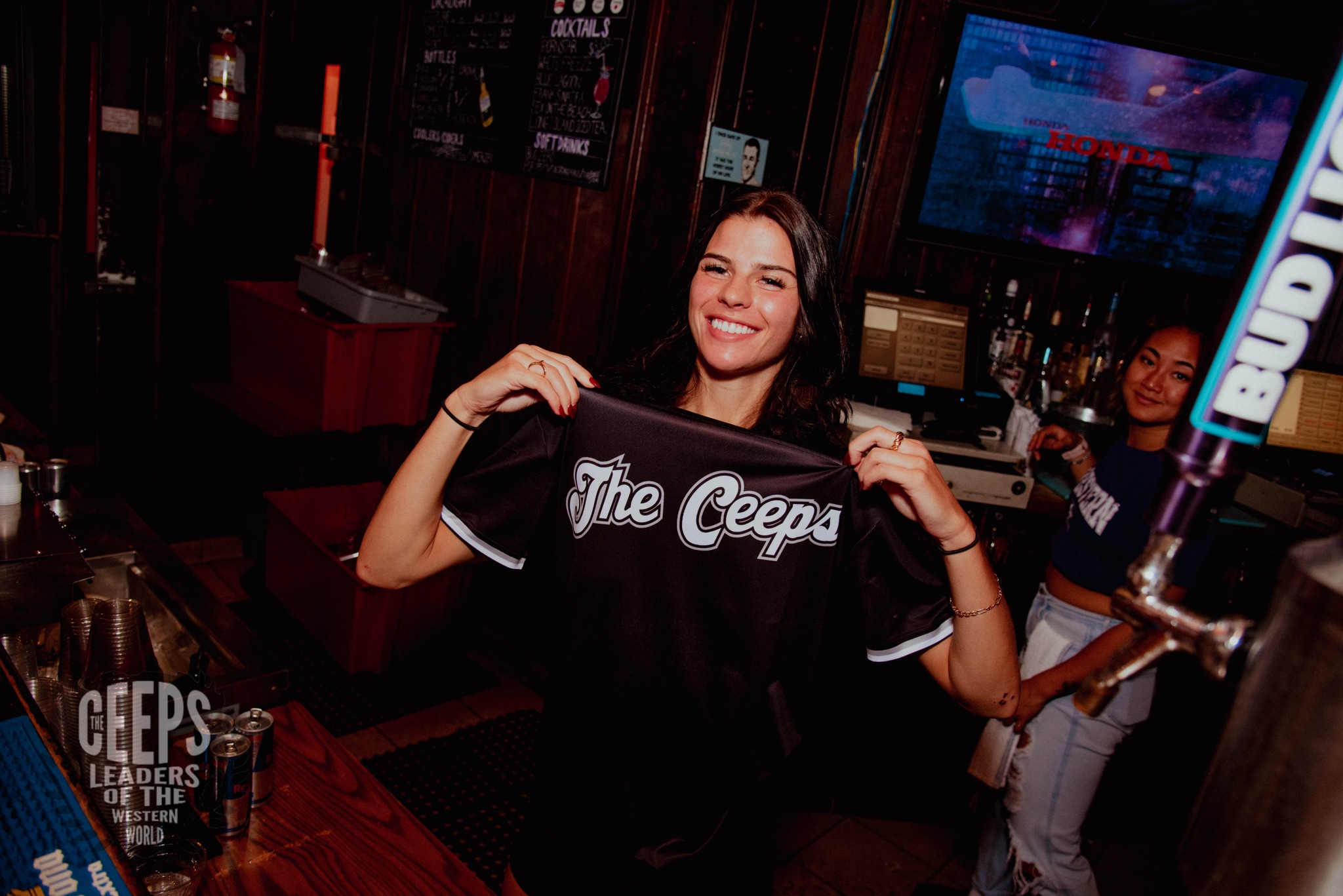 Staff member with Ceeps merch